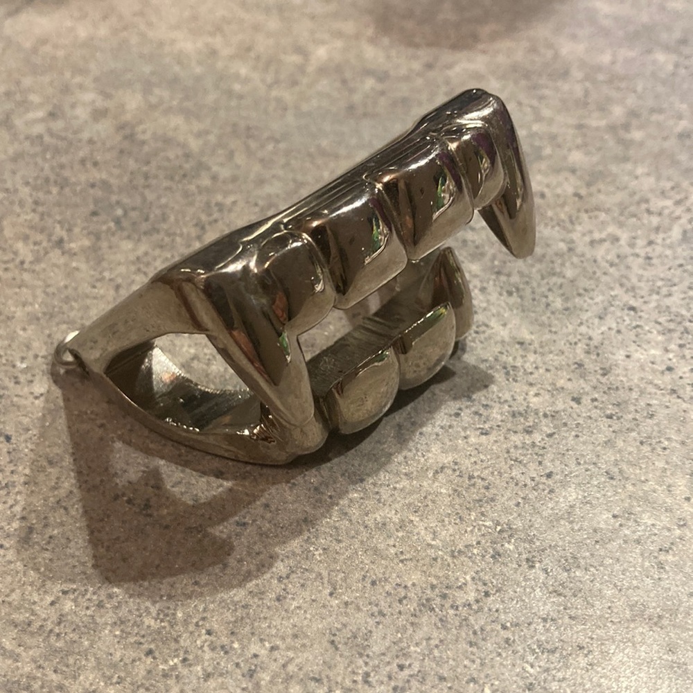 Metal vampire teeth bottle opener